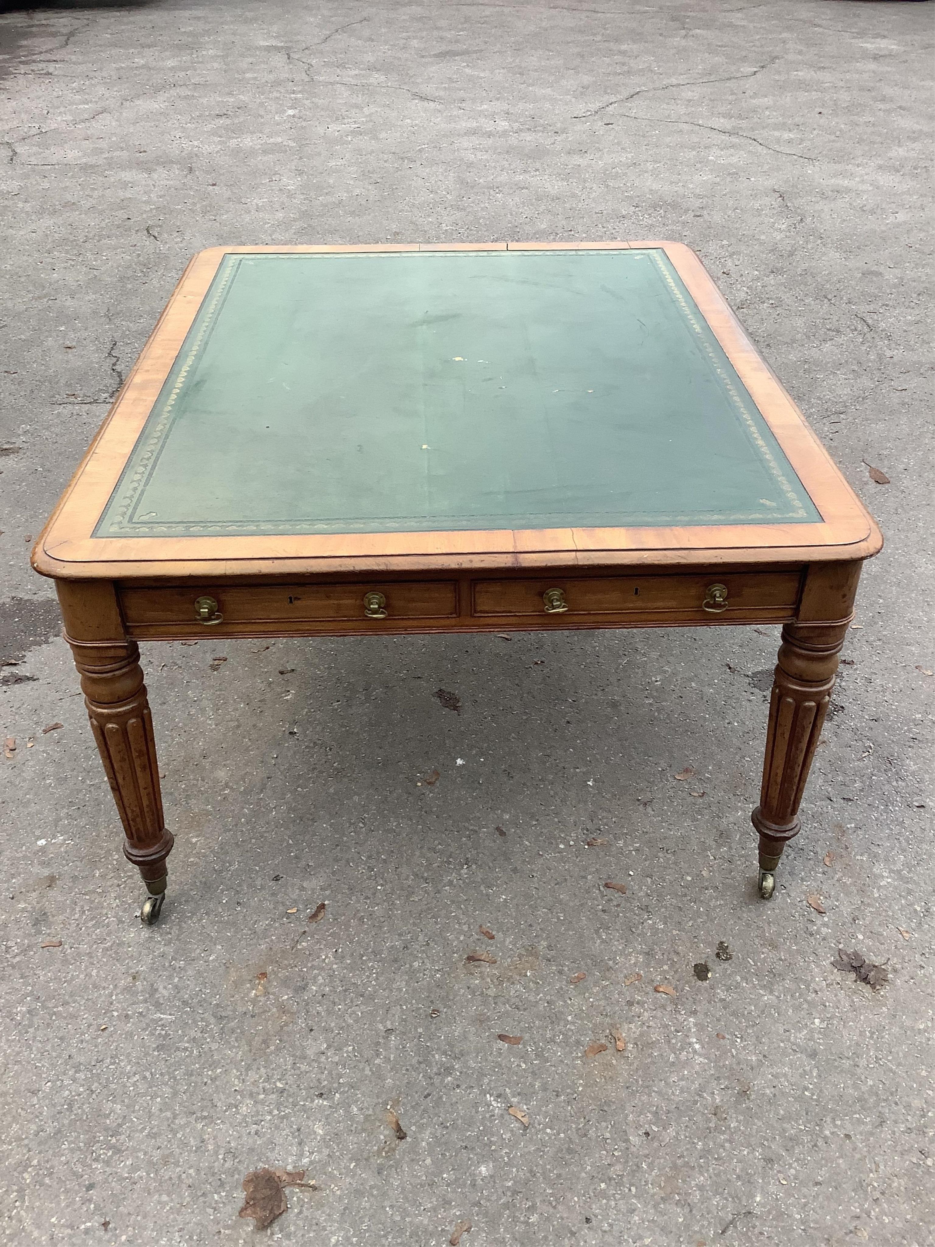 An early Victorian mahogany library table fitted four drawers, width 160cm, depth 130cm, height 78cm. Condition - fair